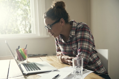 young woman at a computer during classwork from home